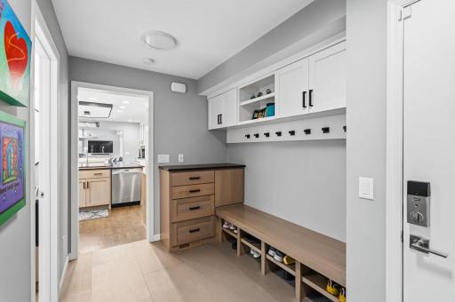 Renovated mud room with all of the storage you need!