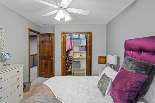 Bedroom includes custom designed closet inserts