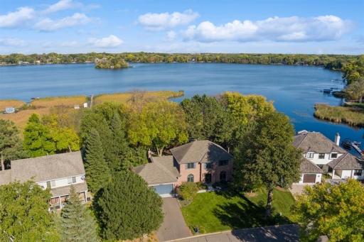 Front aerial view. Enjoy year around lake life with boating, fishing, swimming along with skating in winter.
Bass Lake has no public lake access