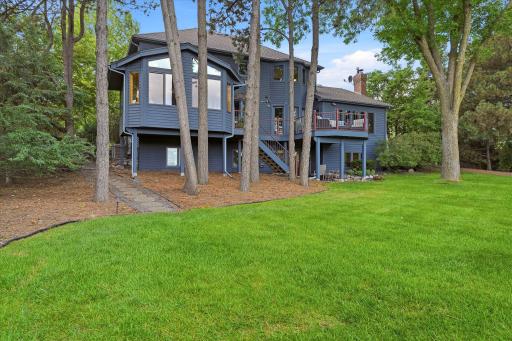 Quality Redwood siding exterior on sides and back of home. Automated (Racio wifi controller) irrigation sprinkler system keeps the yard green while you relax and play on the lake