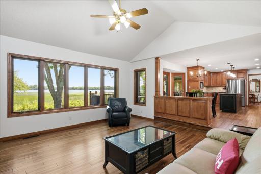 Open Vaulted Family/Great Room with amazing lake views and opening to Informal Dining Room and Kitchen