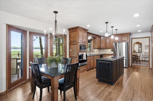 Informal Dining Room with custom built table (stays) to match granite counter tops
