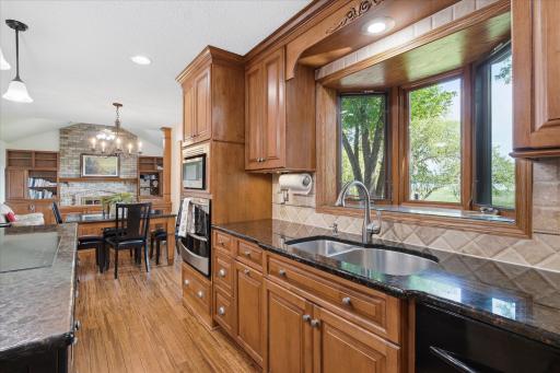 Great entertaining Kitchen opening to Informal Dining Room and vaulted Great Room