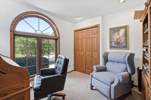 Private Office with custom rounded window, extra deep closet and door
