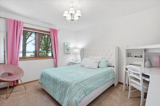 Upper Level 3rd Bedroom of 3 bedrooms on upper level complete with neutral carpet/paint and ceiling light