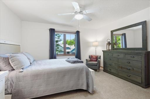 Upper Level 2nd Bedroom of 3rd bedrooms on upper level complete with neutral carpet/paint and ceiling fan/light