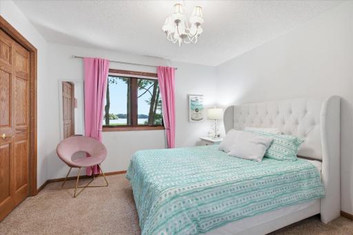 Upper Level 3rd Bedroom of 3 bedrooms on upper level complete with neutral carpet/paint and ceiling light