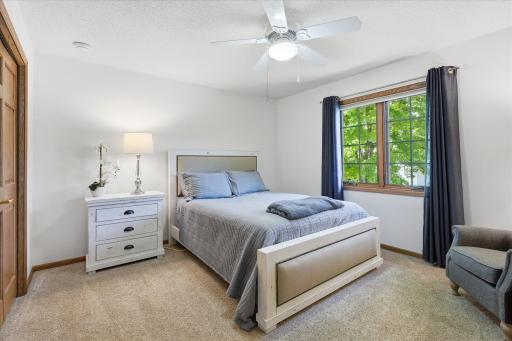 Upper Level 2nd Bedroom of 3rd bedrooms on upper level complete with neutral carpet/paint and ceiling fan/light