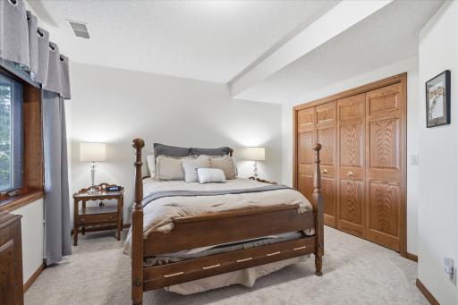 Lower level 4th Bedroom with new carpet and great lake views.