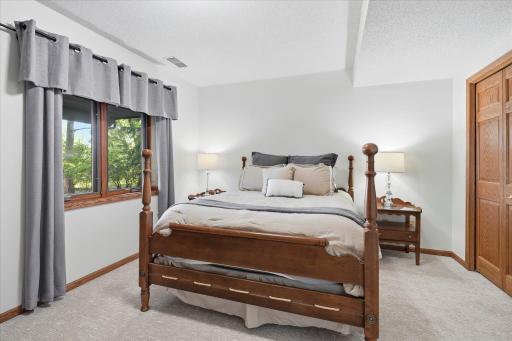 Lower level 4th Bedroom with new carpet and great lake views.