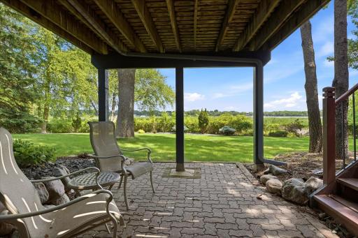 Entertain family /friends with BBQs on your spacious deck with stairs to lower level paver patio. Both have great lake views and nice private outdoor spaces to relax