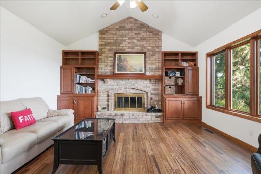 Vaulted Family/Great Room with wood burning fireplace w/brick surround and bamboo hardwood floors.
Sellers haven't used fireplace in many years and not sure of condition