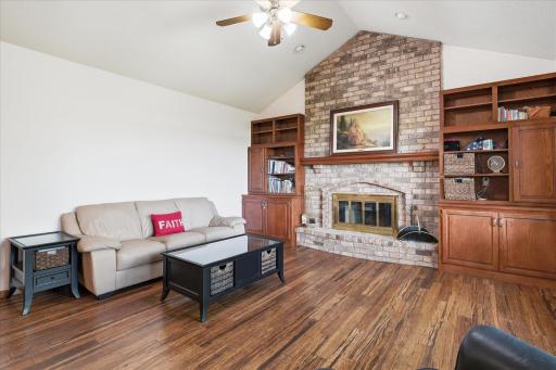 Vaulted Family/Great Room with hardwood floors, wood burning fireplace, built-in cabinets and ceiling fan/light.
Sellers haven't used fireplace in many years and not sure of condition