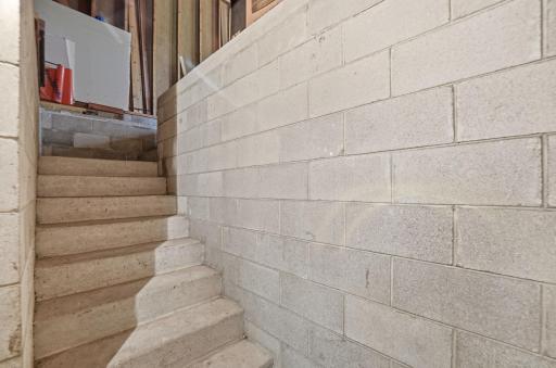 Basement steps leading to the garage