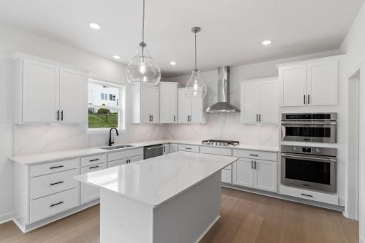 (All the following photos are of a similar home, actual finishes may vary.)