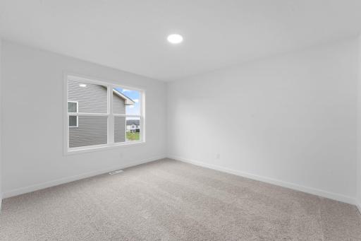 The bedrooms are comfortable spaces that offer a personal retreat away from the main living area.
