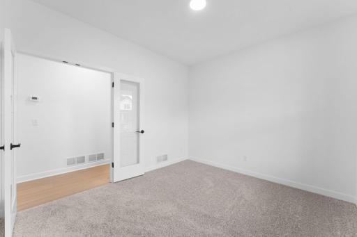 A convenient office can be found near the entry, allowing residents to complete important tasks throughout the day.