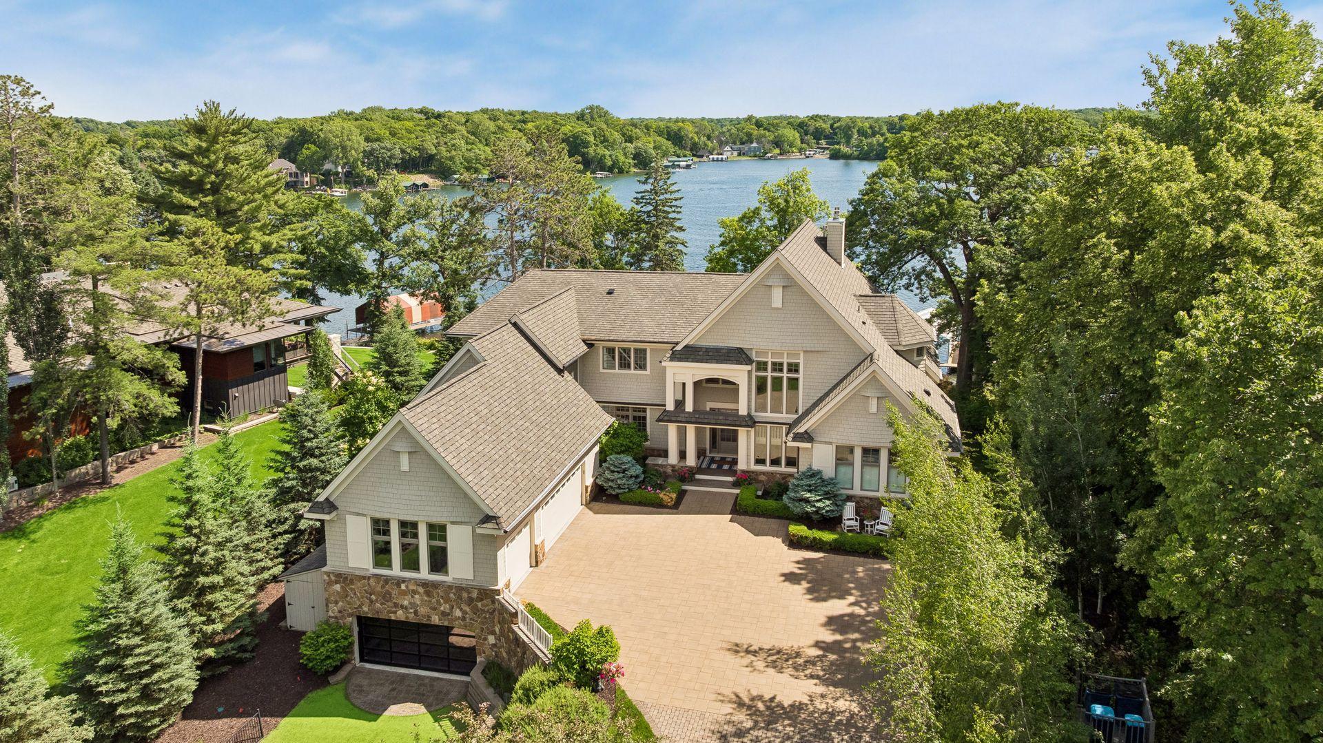 Introducing 5155 Weeks Road in beautiful Greenwood, Minnesota. This breathtaking Lake Minnetonka estate is nestled on 1.17 private acres with 163 feet of rip-rap shoreline and A-grade water quality on Saint Albans Bay.
