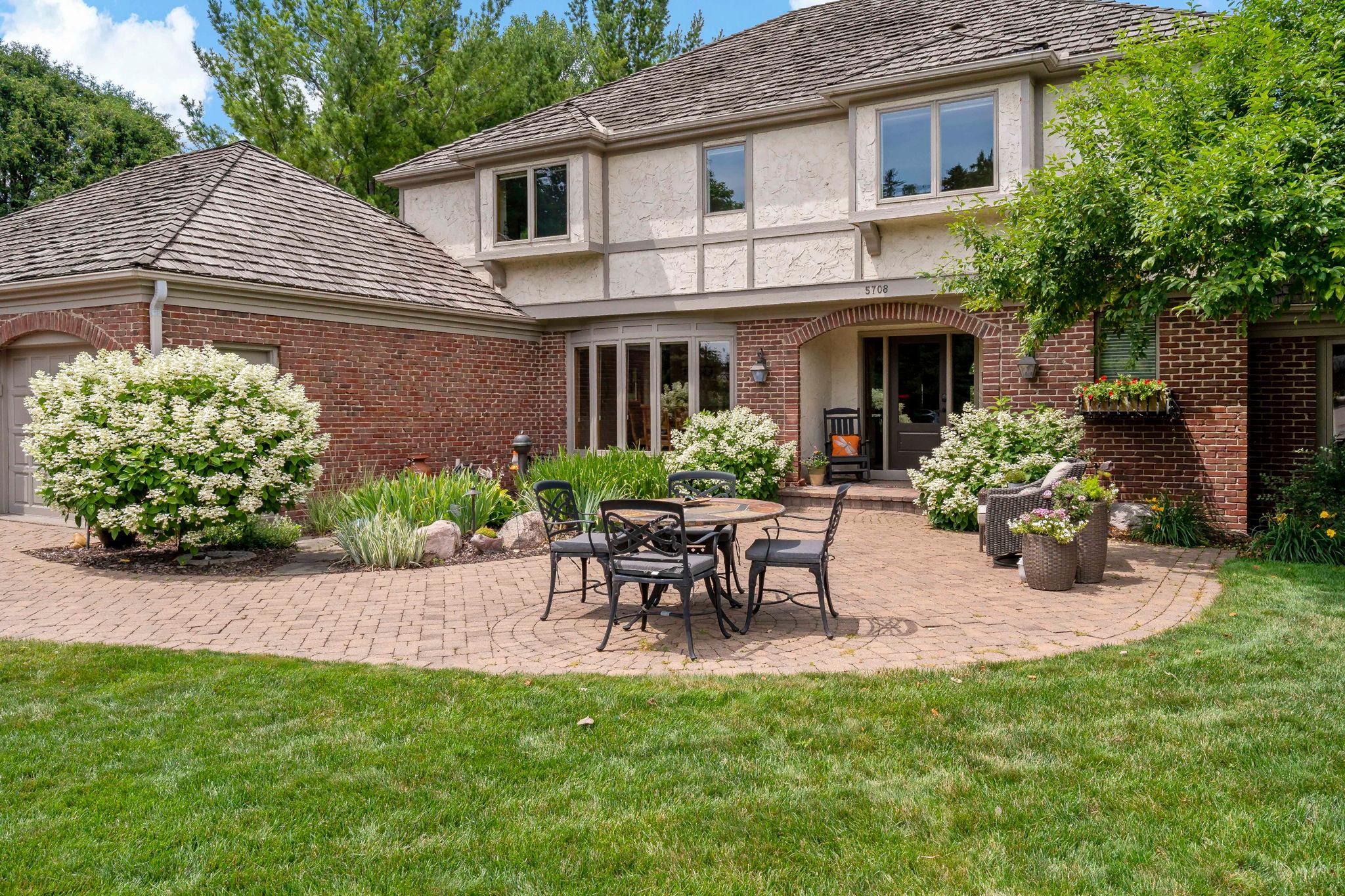 Front patio with beautiful landscaping
