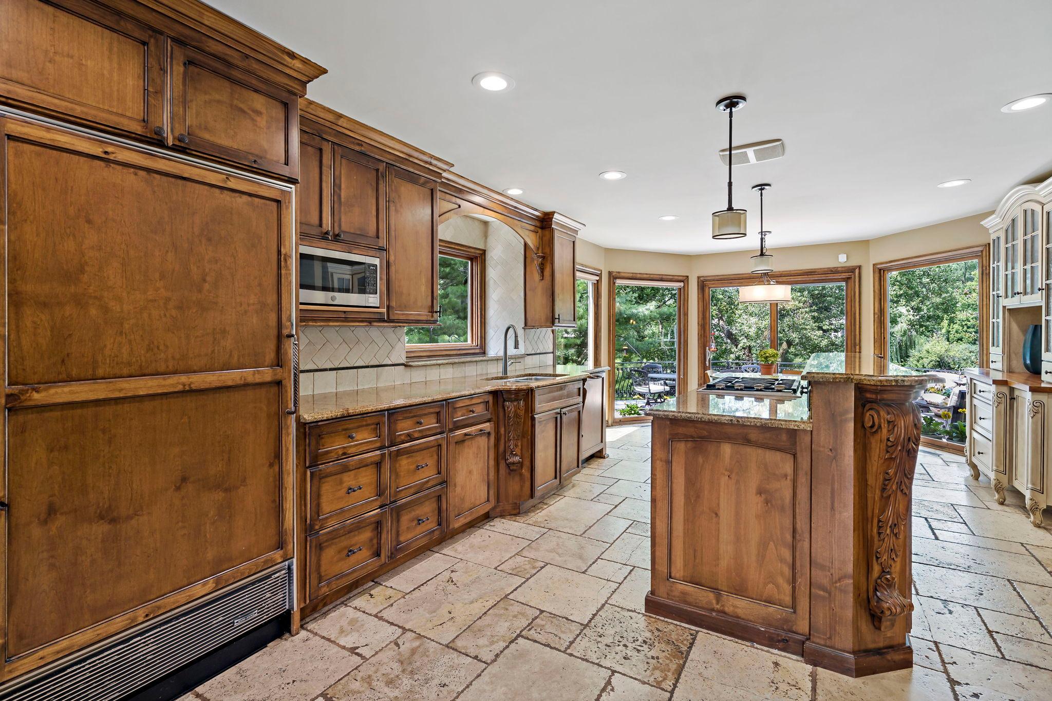 Knotty alder cabinetry and tiled floors