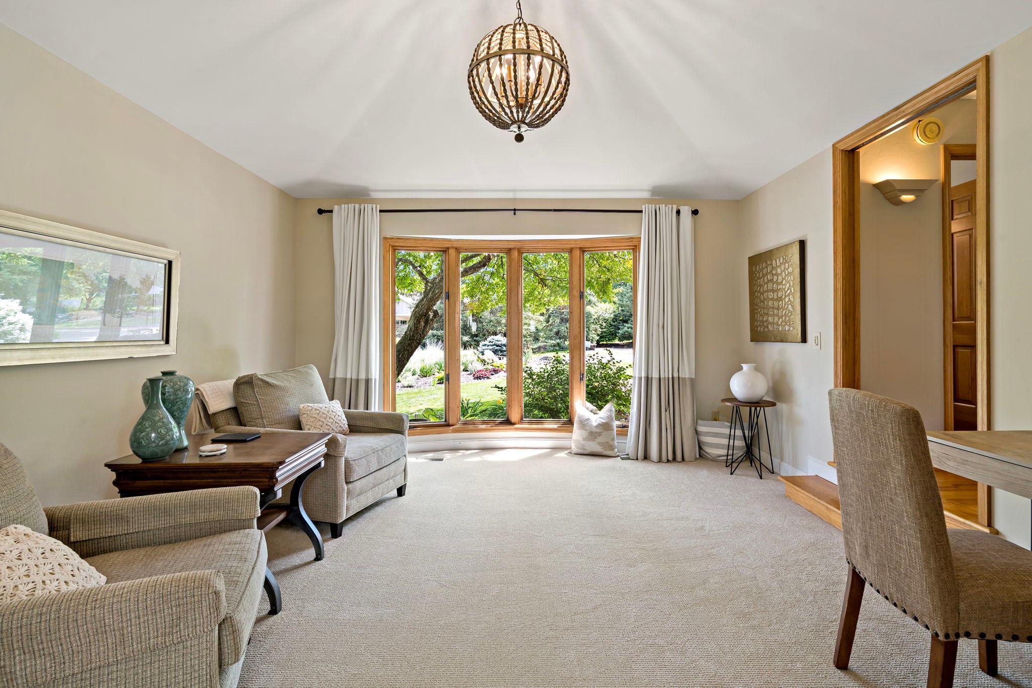 The den includes a closet and could be used as a main floor bedroom, with 3/4 bath just steps away