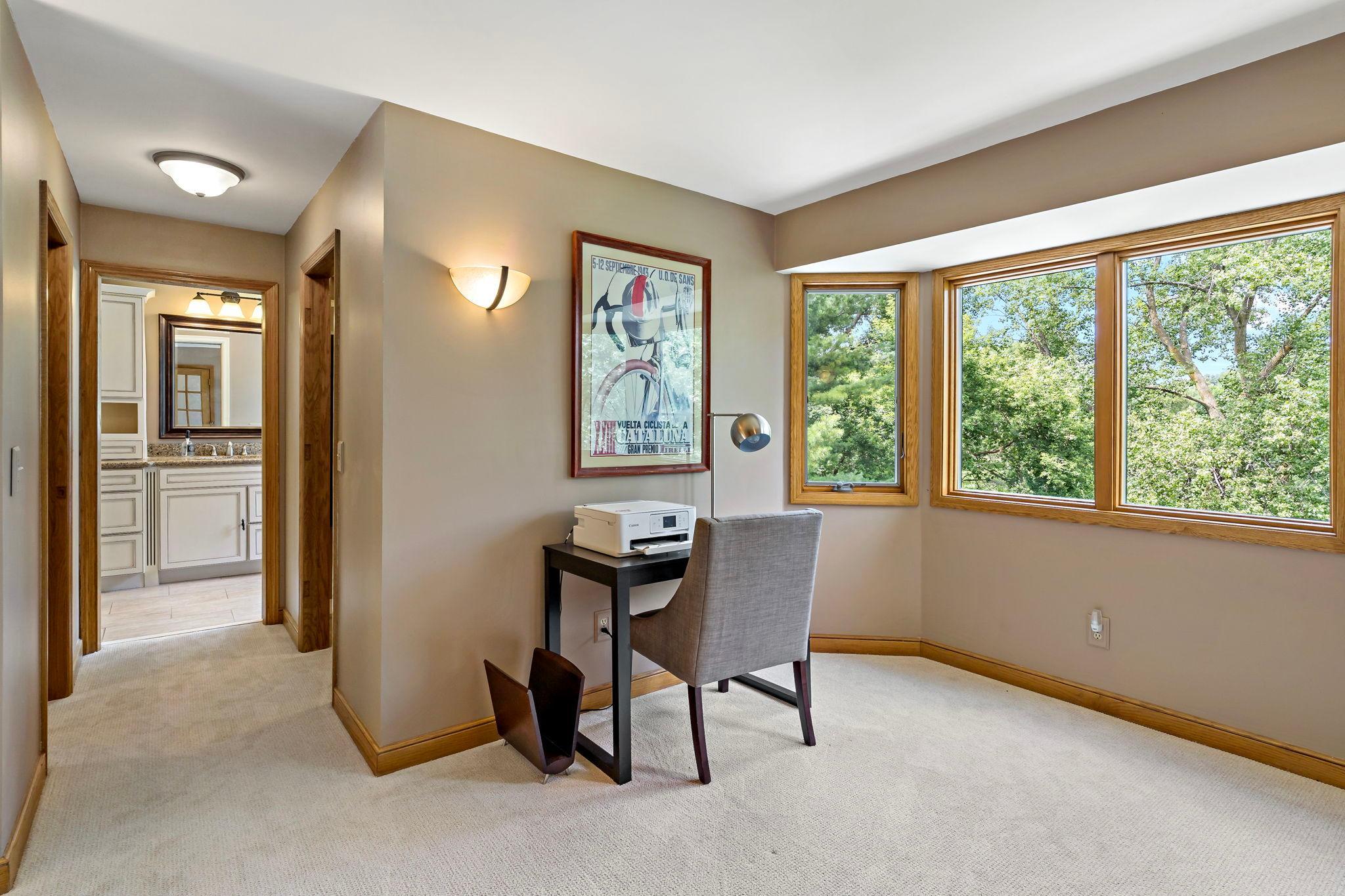 Office leads to two closets and private bath