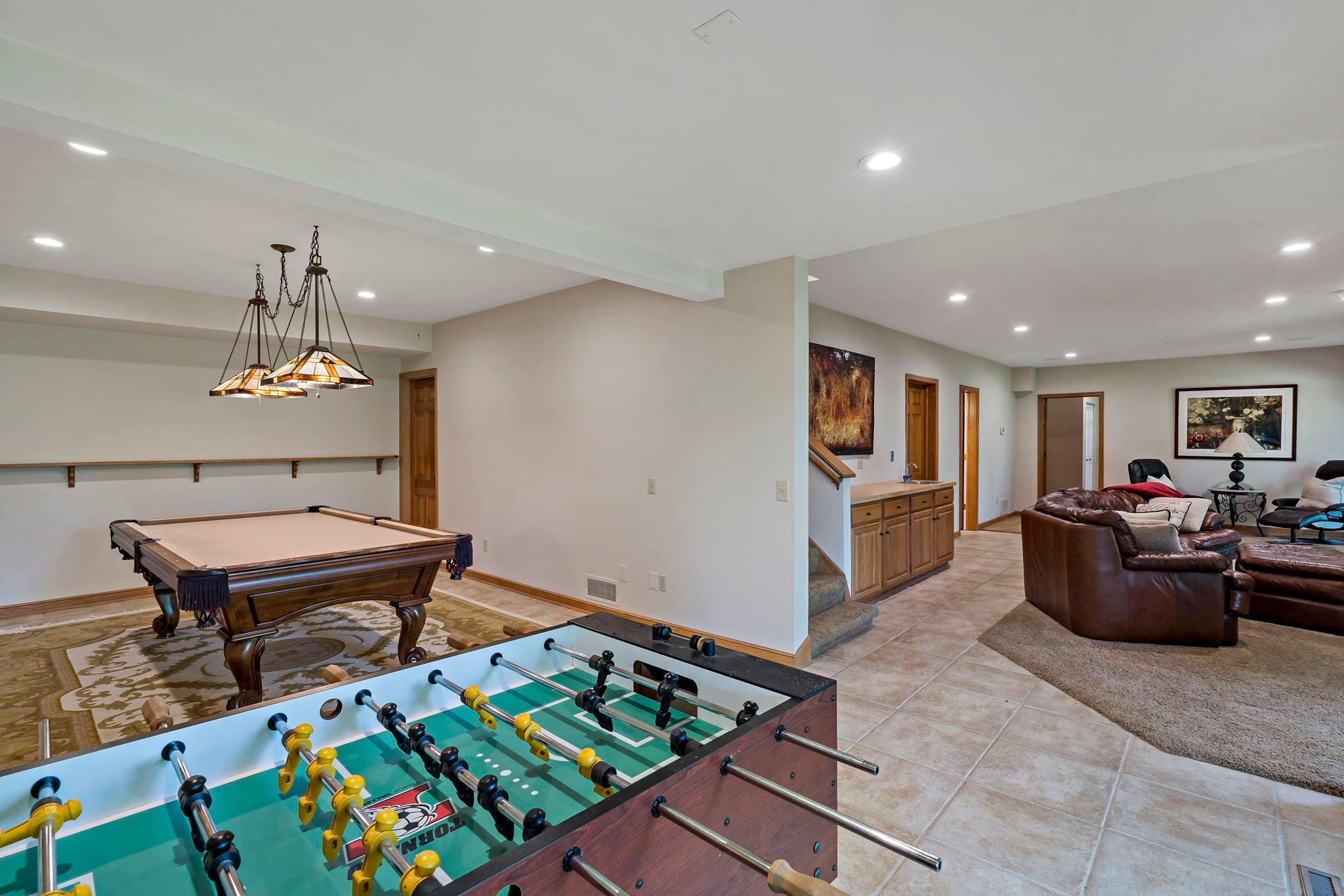 Game room adjacent to lower level amusement room