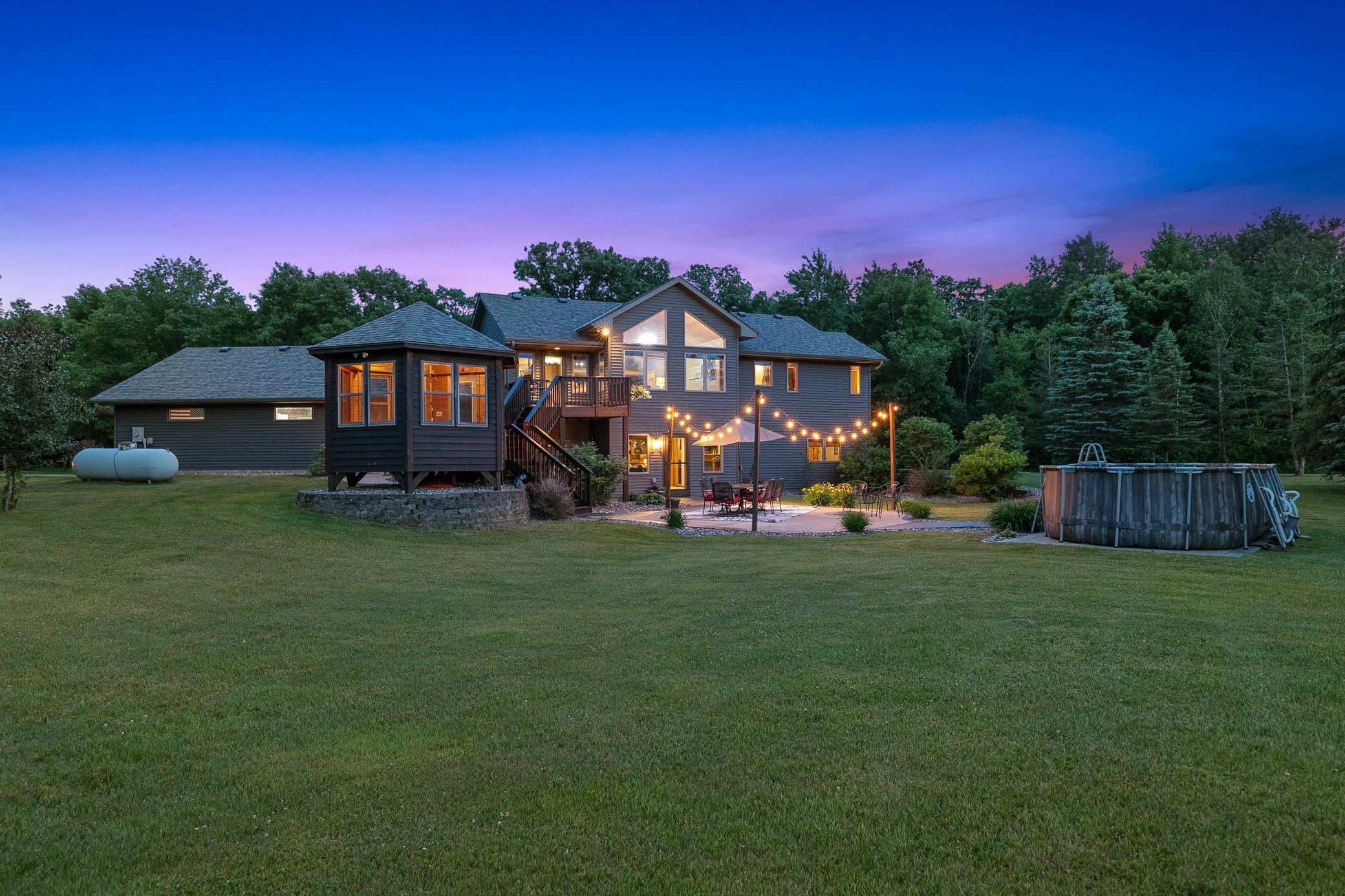 The home has been thoughtfully updated inside and out and is complemented by a spacious outbuilding featuring a heated workshop and ample storage.