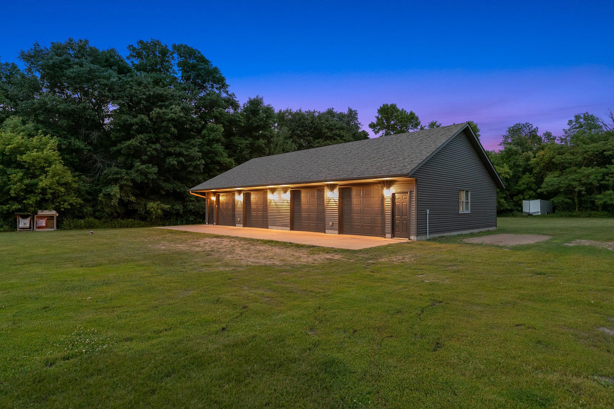 The exterior of the outbuilding was also updated in 2024 with a new roof, vinyl siding, and gutters.