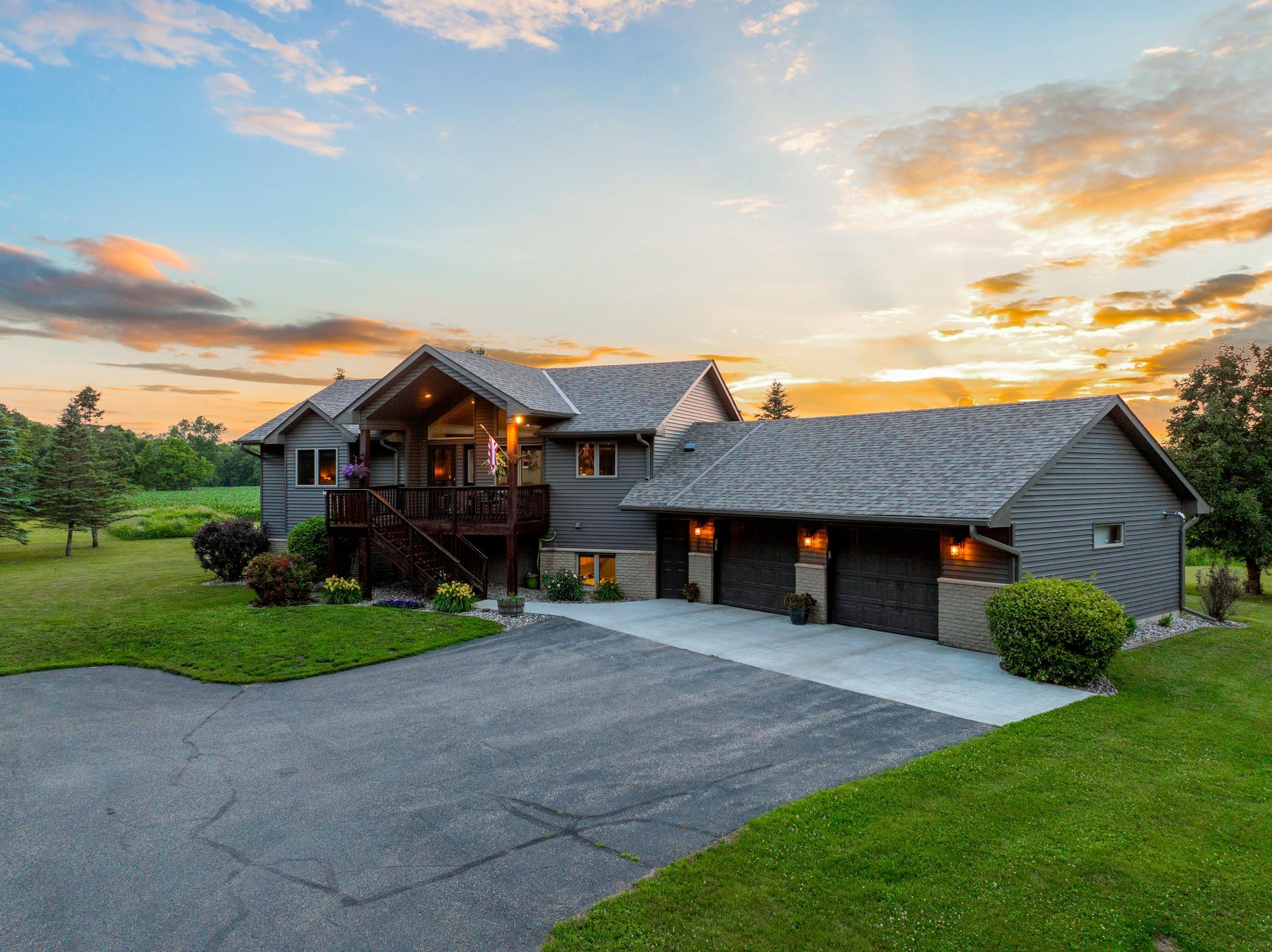 Expansive outdoor spaces, including a deck with a gazebo, a large patio, and a new pool, create an inviting setting for entertaining or unwinding, while the surrounding land provides room to roam and the unique ability to hunt on your own property.