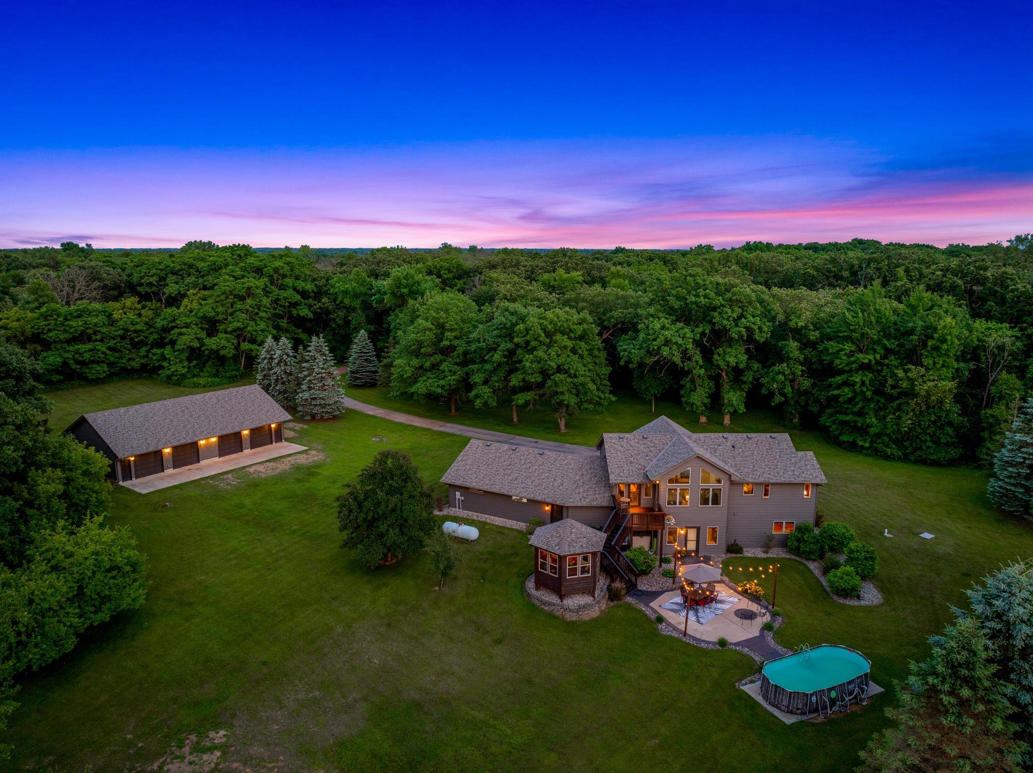 The home has been thoughtfully updated inside and out and is complemented by a spacious outbuilding featuring a heated workshop and ample storage.