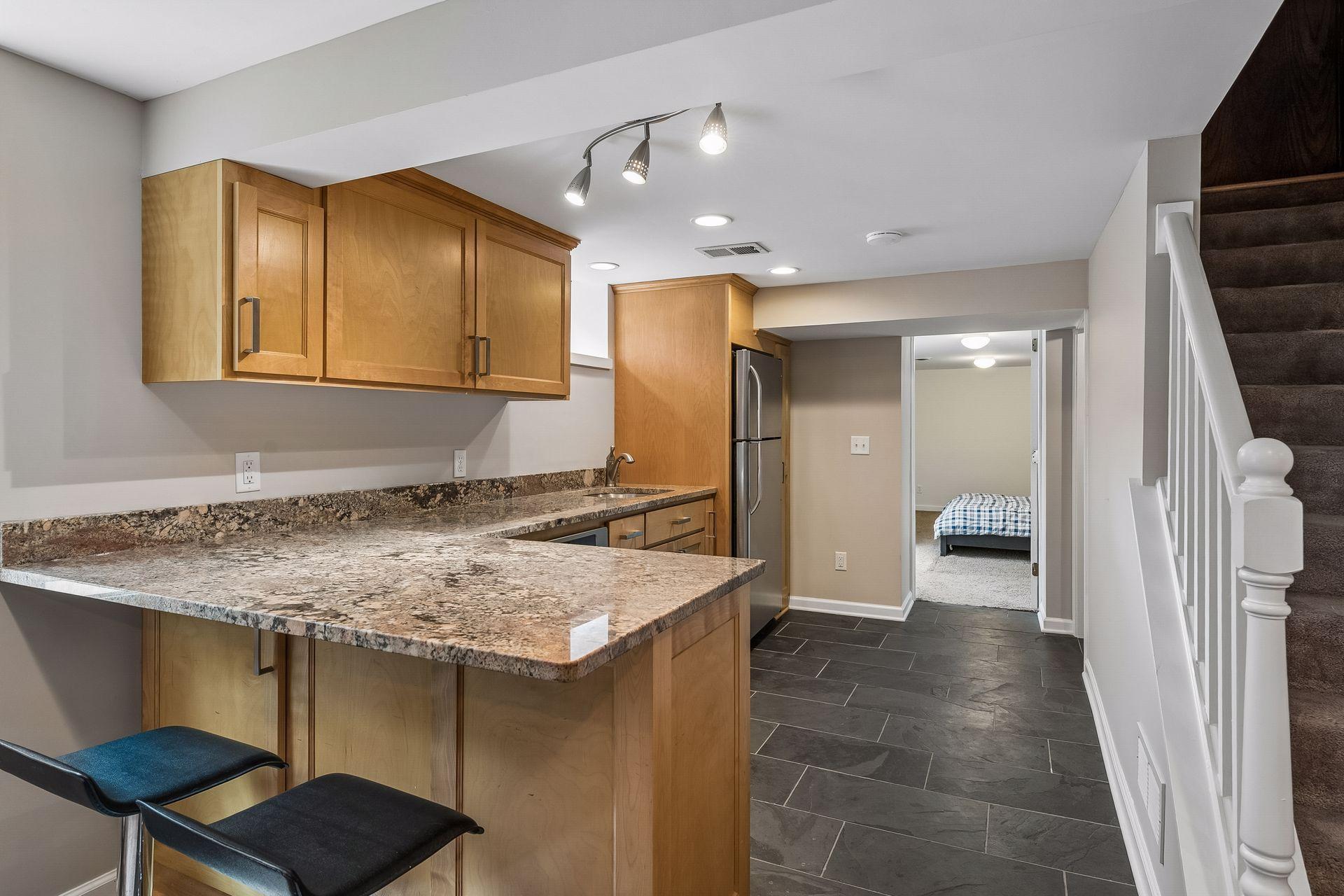 2nd kitchen in lower level with slate floor