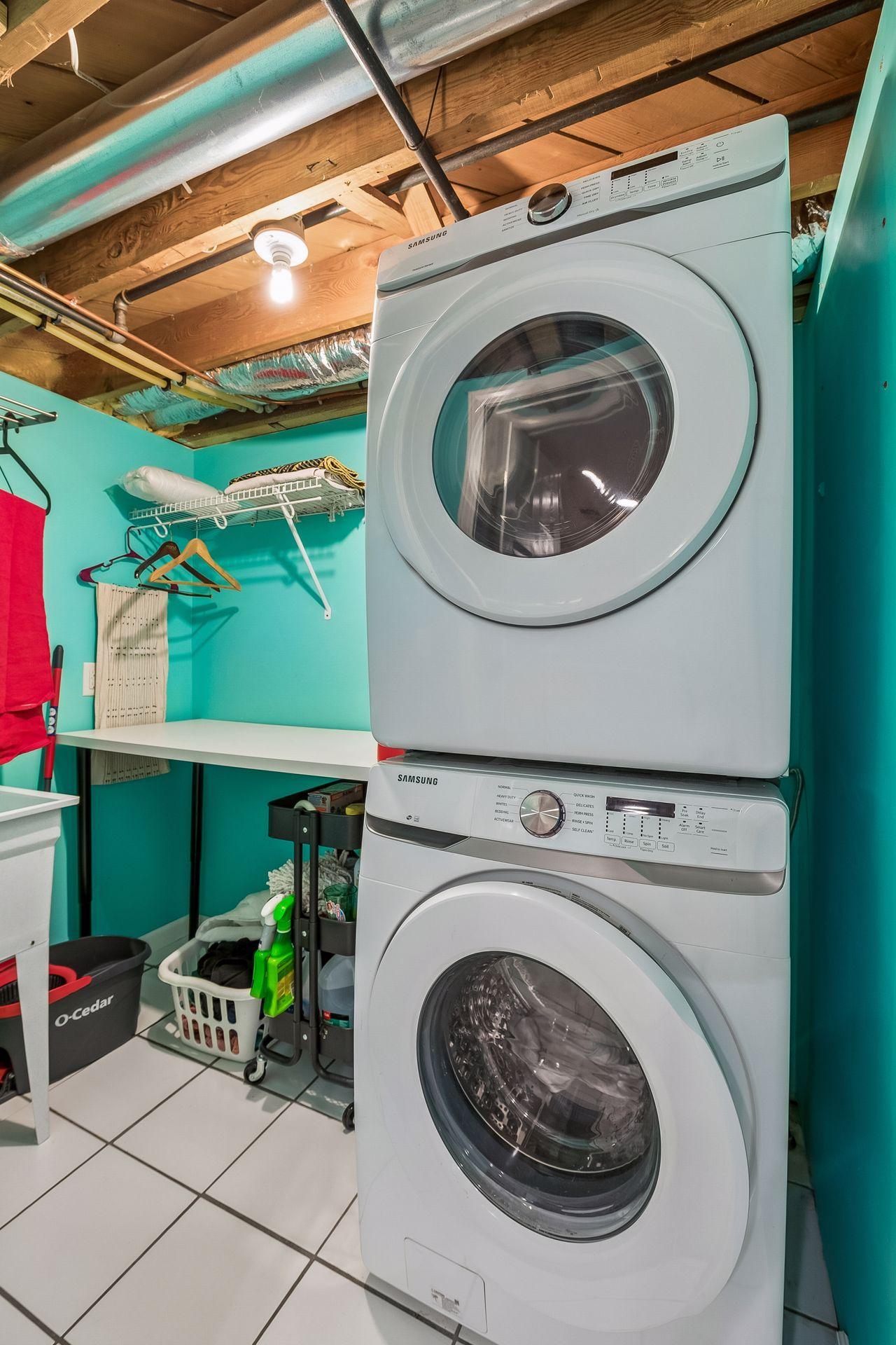 Laundry room with new washer and dryer 2024, sink and folding counter