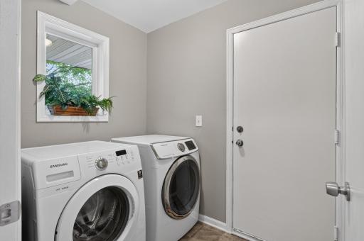 Laundry room and access to the attached 2 car garage.