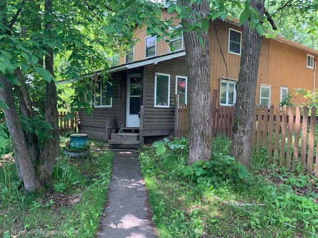 Wooded retreat with 2 story tucked away