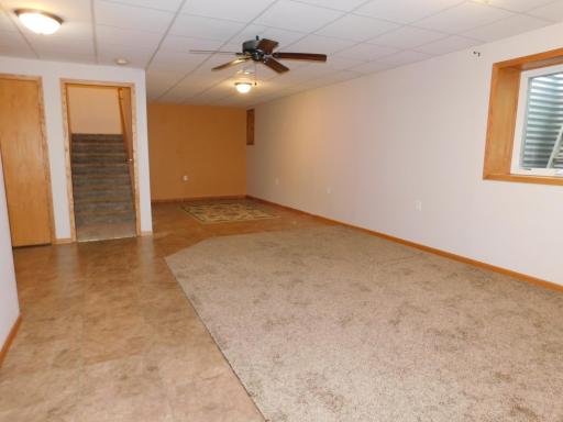 Lower level is finished with family room and space for office or play area.