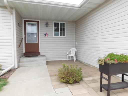 Patio in the front to enjoy the neighborhood.
