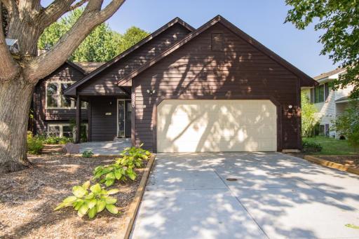 The driveway leading to the oversized garage was recently completed in 2025