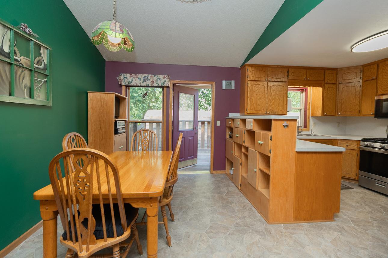 The dining room leads the way to kitchen cookin' or backyard grillin'