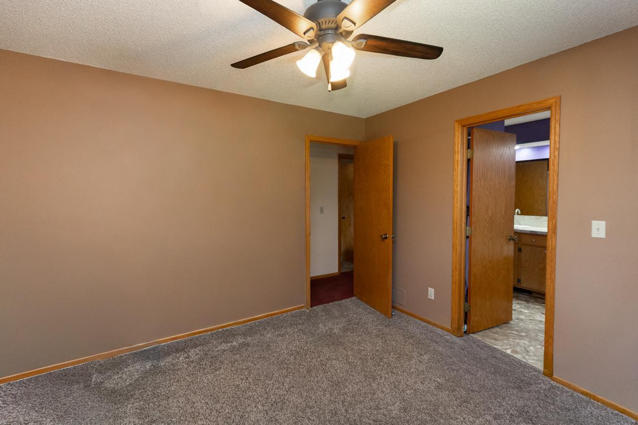 Pass-through from this 12x11 UL bedroom to full bath