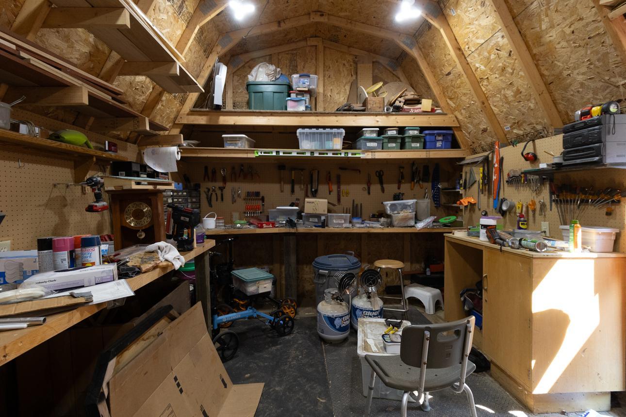 Tools, yard maintenance equipment and the like will all find their home in one-half of the workshop