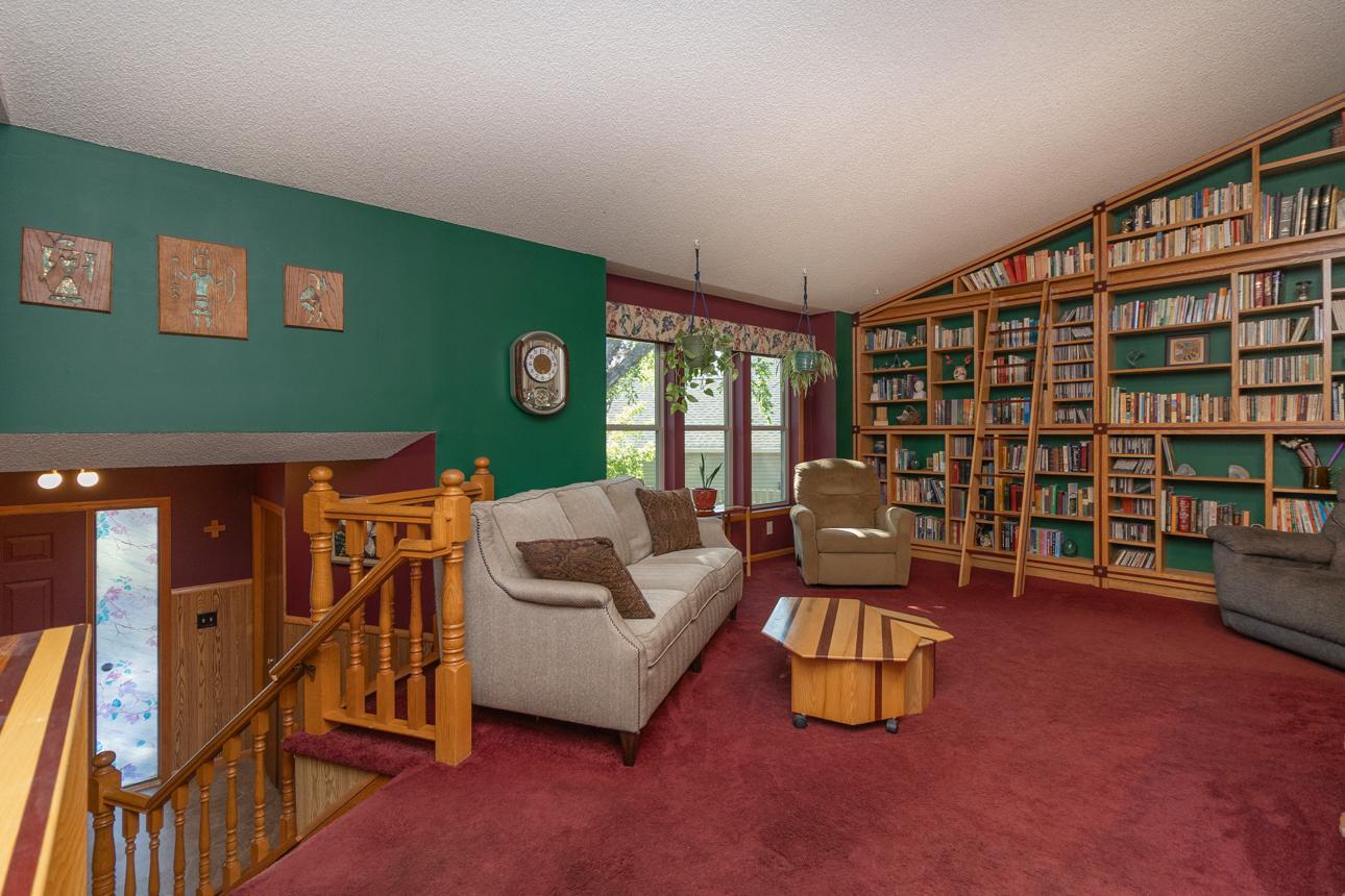 Good-sized entry with a closet leads to vaulted living area with lots of natural light