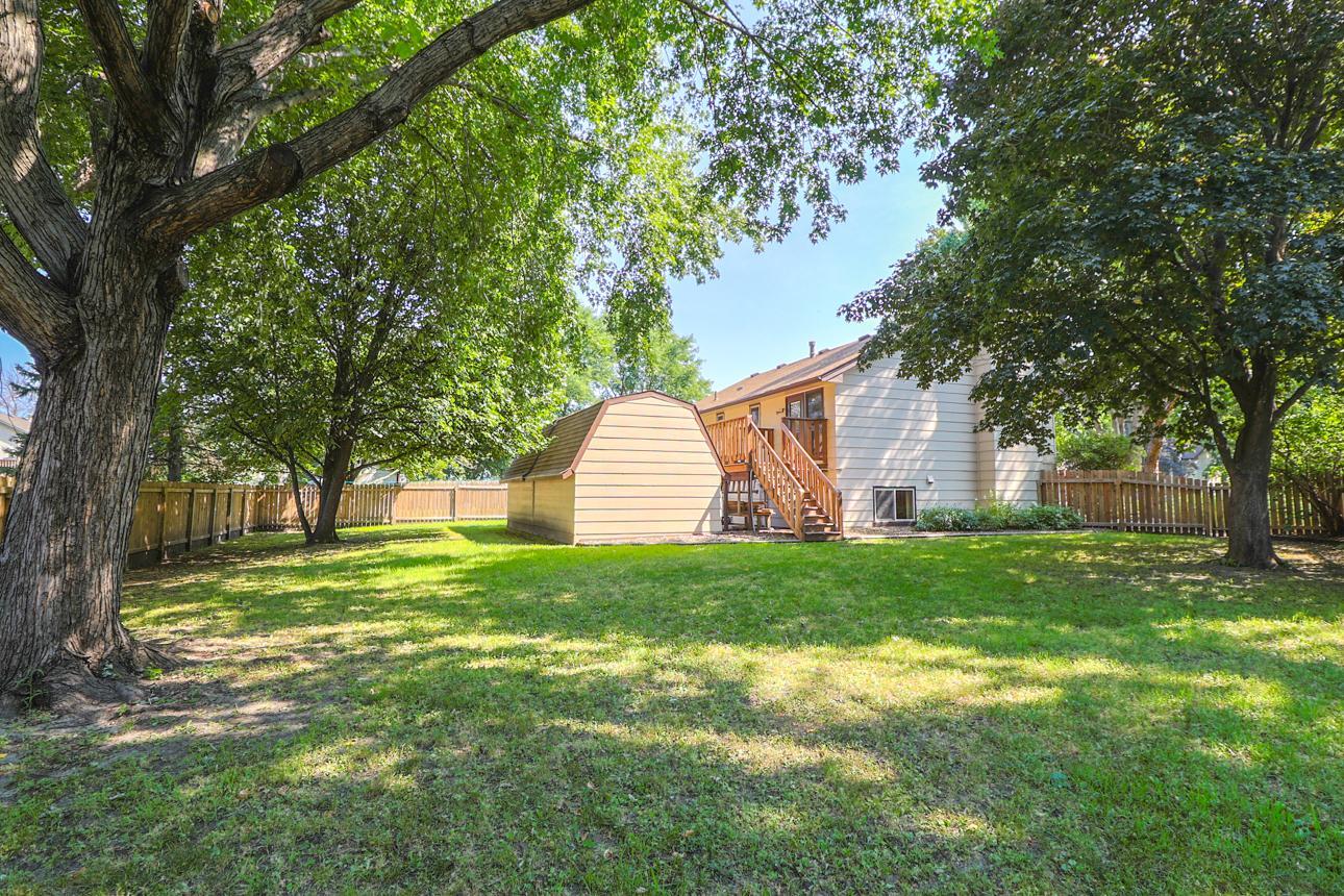 Find yourself in the spacious, fully-fenced backyard, where kids and pups run free!