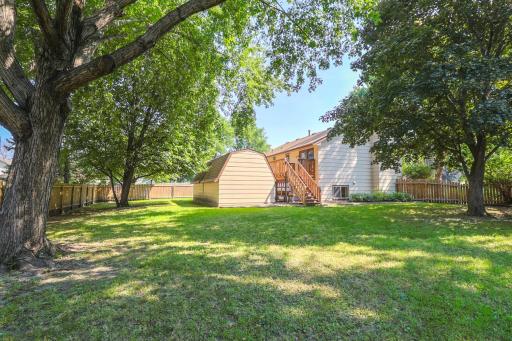 Find yourself in the spacious, fully-fenced backyard, where kids and pups run free!