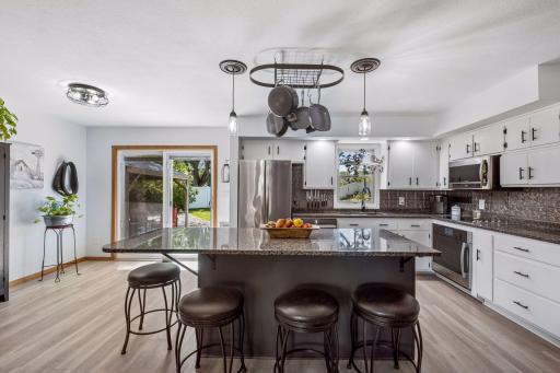 Beautiful kitchen with a large island perfect for cooking prep or entertaining!