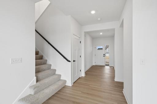 The foyer allows you to see the open and bright nature of the home right upon entry.