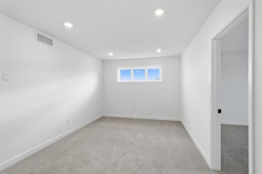 The loft area is located at the top of the stairs on the second floor and is well-suited for a living room or children’s area.