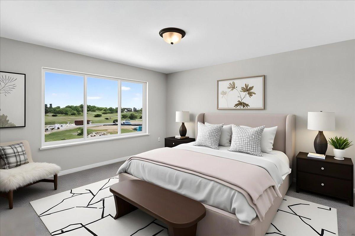 PHOTO OF A DIFFERENT HOME WITH SIMILAR PLAN & FINISHES VIRTUALLY STAGED. Primary Suite offers backyard views.