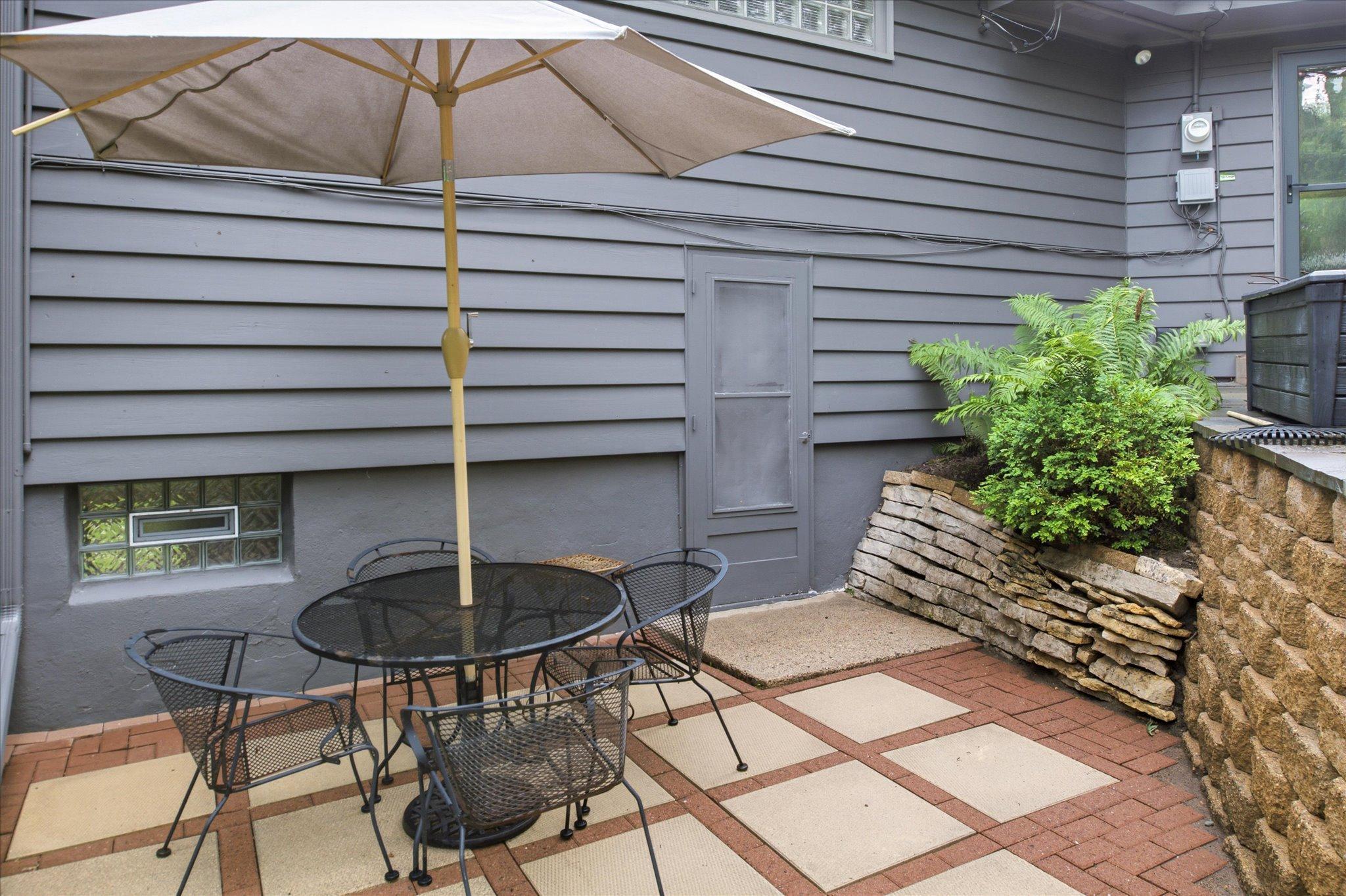 Lower level paver and stone patio