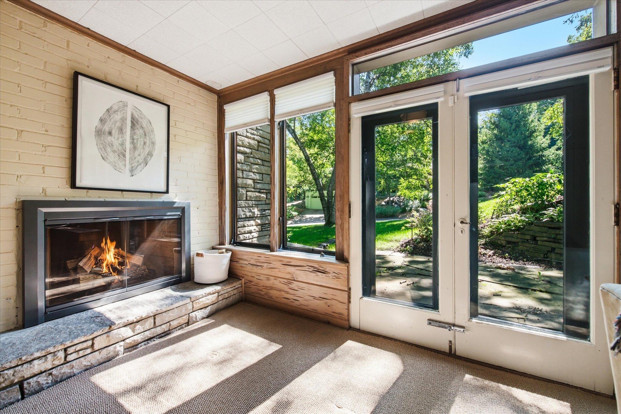 Walk out lower level family room with wood burning fireplace